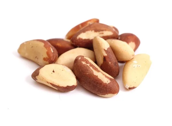 Raw brazil nuts pile closeup